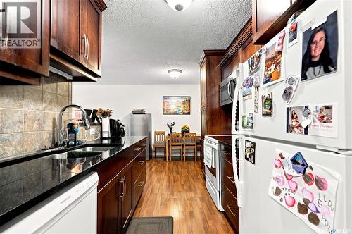 219 122 Edinburgh Place, Saskatoon, SK - Indoor Photo Showing Kitchen With Double Sink