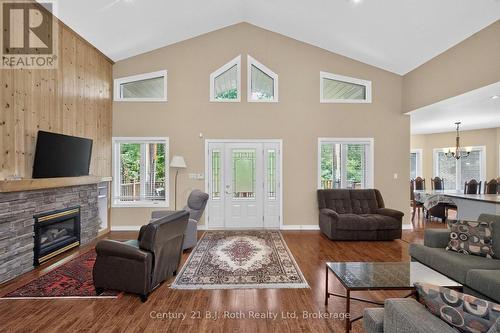 11 Rue Karola Road, Tiny, ON - Indoor Photo Showing Living Room With Fireplace