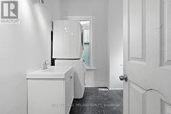 Main Floor: 3-Piece Bathroom with Laundry - 