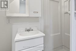 Main Floor: 3-Piece Bathroom Off of Bedroom 2 - 