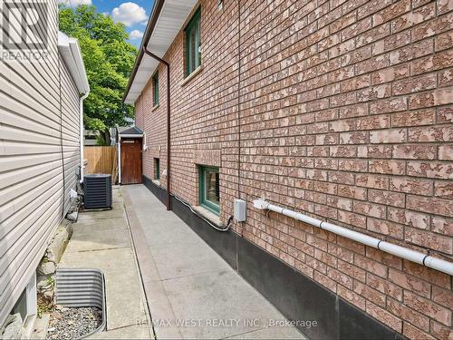 Exposed Aggregate Wraparound Walkway - 335 East Avenue N, Hamilton, ON - Outdoor With Exterior