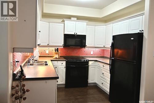 106 110 Armistice Way, Saskatoon, SK - Indoor Photo Showing Kitchen With Double Sink