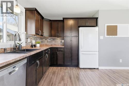 18 Mackie Crescent, Saskatoon, SK - Indoor Photo Showing Kitchen With Double Sink
