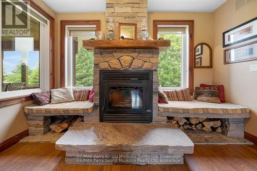 25 Cole Point Trail, Mckellar, ON - Indoor Photo Showing Living Room With Fireplace