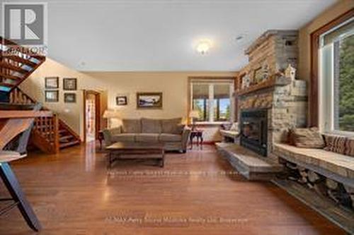25 Cole Point Trail, Mckellar, ON - Indoor Photo Showing Living Room With Fireplace