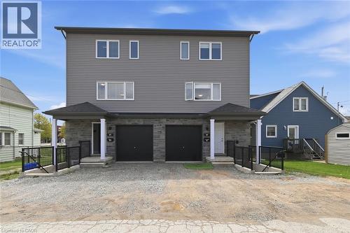 Contemporary duplex structure with gray siding and stone facade - 5 Hagar Street, Thorold, ON - Outdoor