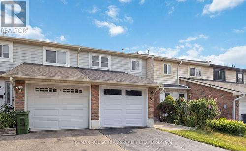 Upgraded Garage Door - 77 Lowry Square, Toronto, ON - Outdoor