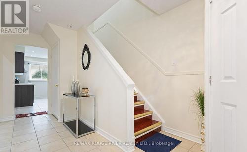 Easy clean ceramic floors - 77 Lowry Square, Toronto, ON - Indoor Photo Showing Other Room