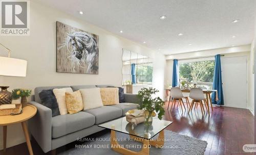 Virtually Staged Living Dining Areas - 77 Lowry Square, Toronto, ON - Indoor Photo Showing Living Room