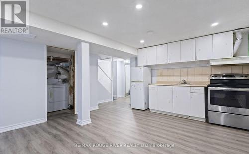 Rec Room and Kitchen - 77 Lowry Square, Toronto, ON - Indoor Photo Showing Kitchen