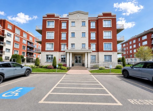 Façade - 403-110 Rue Barnett, Dollard-Des-Ormeaux, QC - Outdoor With Balcony With Facade
