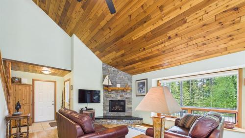 9387 Moyie Shores Estates Road, Moyie, BC - Indoor Photo Showing Living Room With Fireplace