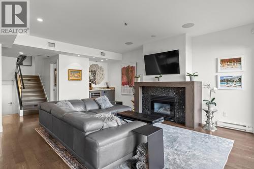 1156 Sunset Drive Unit# 123, Kelowna, BC - Indoor Photo Showing Living Room With Fireplace