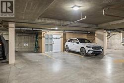 2 privately owned parking stalls by back entrance - 