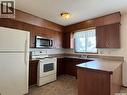 208 2Nd Street Ne, Watson, SK  - Indoor Photo Showing Kitchen With Double Sink 