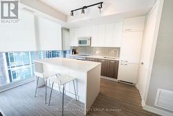 Kitchen w/Quartz Counters & European Appliances - 