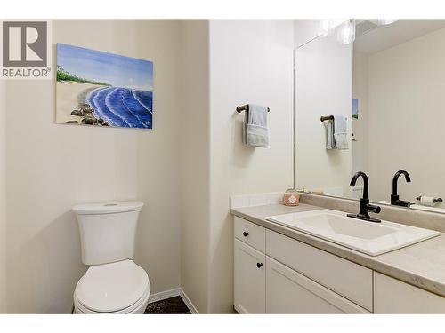 Powder room on the main level - 133 Wyndham Crescent Unit# 110, Kelowna, BC - Indoor Photo Showing Bathroom