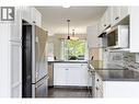 Functional kitchen with stainless steel appliances - 133 Wyndham Crescent Unit# 110, Kelowna, BC  - Indoor Photo Showing Kitchen 