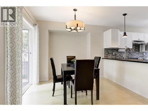 Dining room with access to back deck - 133 Wyndham Crescent Unit# 110, Kelowna, BC - Indoor