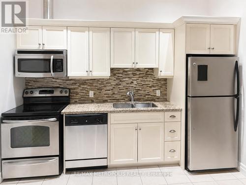 110 - 25 Concession Street, Cambridge, ON - Indoor Photo Showing Kitchen With Stainless Steel Kitchen With Double Sink
