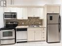 110 - 25 Concession Street, Cambridge, ON  - Indoor Photo Showing Kitchen With Stainless Steel Kitchen With Double Sink 