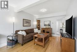 Hardwood flooring throughout the living space - 