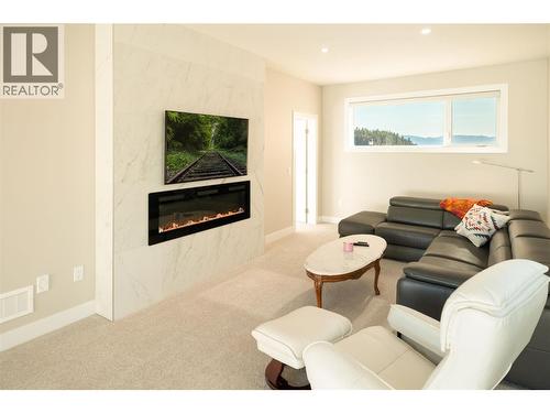 274 Summer Wood Drive, Kelowna, BC - Indoor Photo Showing Living Room With Fireplace