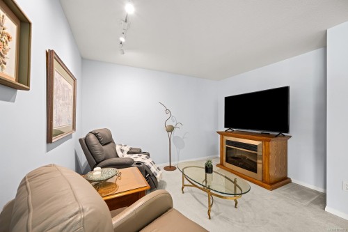 202-2275 Comox Ave, Comox, BC - Indoor With Fireplace