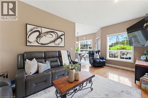 Spacious interior featuring neutral wall tones and wood-finish flooring - 29 Watson Crescent, Ayr, ON - Indoor Photo Showing Living Room
