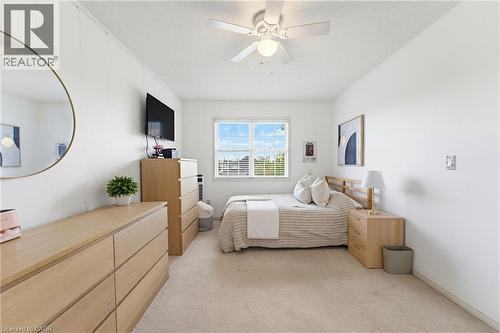 Spacious room featuring neutral carpeting and white walls - 29 Watson Crescent, Ayr, ON - Indoor Photo Showing Bedroom