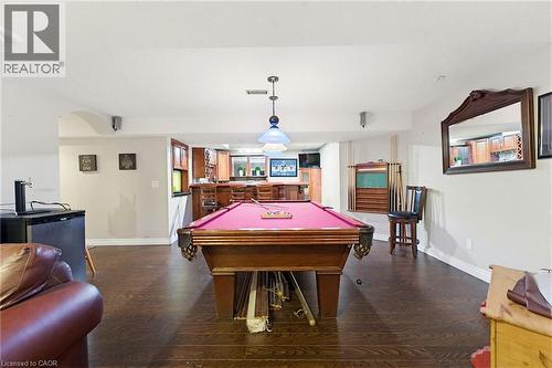 Spacious entertainment area featuring wood-finish flooring - 29 Watson Crescent, Ayr, ON - Indoor Photo Showing Other Room