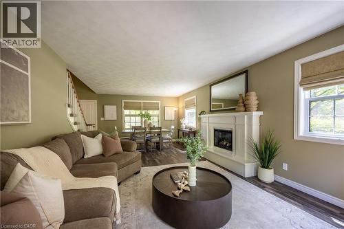 1 Bostwick Crescent, Lynedoch, ON - Indoor Photo Showing Living Room With Fireplace