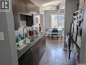 13 3030 Arlington Avenue, Saskatoon, SK  - Indoor Photo Showing Kitchen With Double Sink 