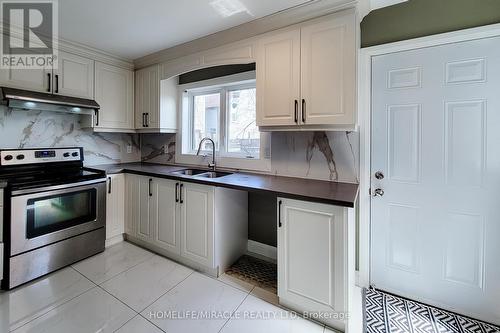 334 Gage Avenue, Hamilton, ON - Indoor Photo Showing Kitchen With Double Sink