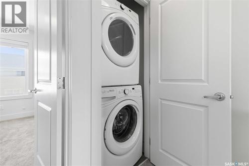 711 Meadows Boulevard, Saskatoon, SK - Indoor Photo Showing Laundry Room