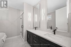 Double Sinks with Quartz & Wall Lighting - 