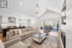 Vaulted Ceiling & Large Plank Hardwood Flooring. - 