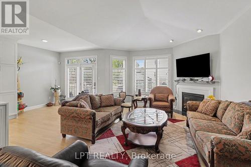 1942 Caprihani Way, Ottawa, ON - Indoor Photo Showing Living Room With Fireplace