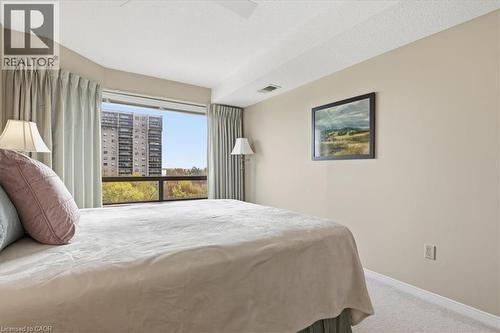 Bedroom featuring carpet flooring and neutral wall tones - 10 Ellen Street E Unit# 808, Kitchener, ON - Indoor Photo Showing Bedroom