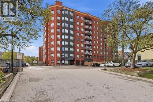 Multi-story brick and panel facade building with balconies - 10 Ellen Street E Unit# 808, Kitchener, ON - Outdoor With Facade