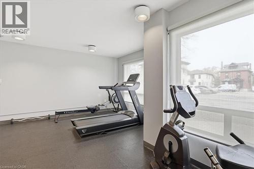 Dedicated fitness area with rubberized flooring - 10 Ellen Street E Unit# 808, Kitchener, ON - Indoor Photo Showing Gym Room