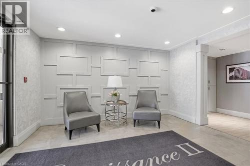 Entryway with decorative wall paneling, recessed lighting, and light-toned flooring - 10 Ellen Street E Unit# 808, Kitchener, ON - Indoor Photo Showing Other Room