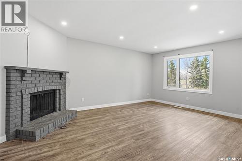 6602 Collins Bay, Regina, SK - Indoor With Fireplace