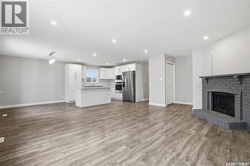 6602 Collins Bay, Regina, SK - Indoor With Fireplace