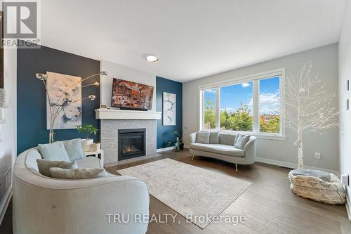 43 Aridus Crescent, Ottawa, ON - Indoor Photo Showing Living Room With Fireplace