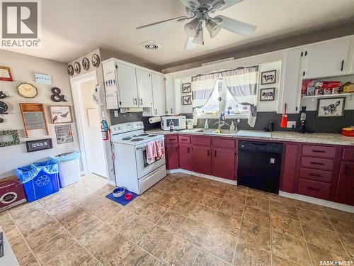 319 March Avenue E, Langenburg, SK - Indoor Photo Showing Kitchen With Double Sink