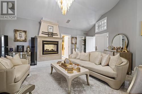 24 Mcarthur Heights, Brampton, ON - Indoor Photo Showing Living Room With Fireplace