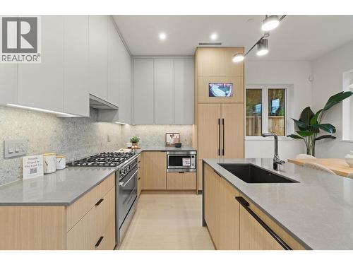 2 1945 E 13Th Avenue, Vancouver, BC - Indoor Photo Showing Kitchen With Upgraded Kitchen