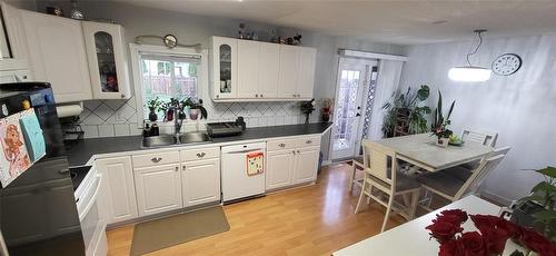 2 Westwood Bay, Brandon, MB - Indoor Photo Showing Kitchen With Double Sink