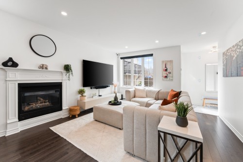 Salon - 589 Rue De Pompadour, Mascouche, QC - Indoor Photo Showing Living Room With Fireplace